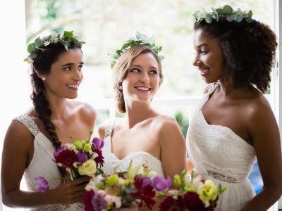 bride-and-bridesmaids-standing-with-bouquet-WUP98TF.jpg